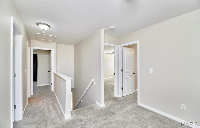 460 Fortress Ct, Saint Charles, MO 63303 - corridor with an upstairs landing, carpet floors, attic access, and baseboards