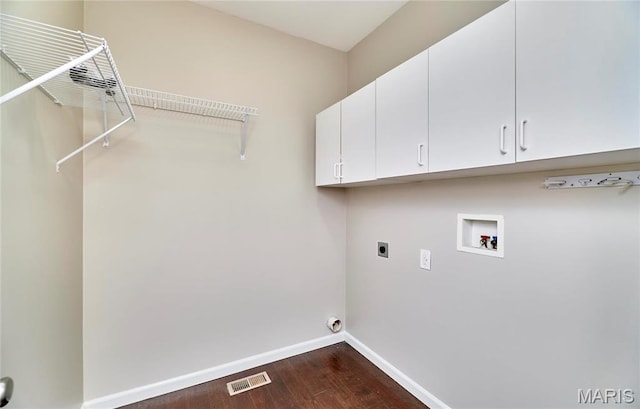 460 Fortress Ct, Saint Charles, MO 63303 - washroom featuring cabinet space, hookup for a washing machine, electric dryer hookup, dark wood finished floors, and baseboards