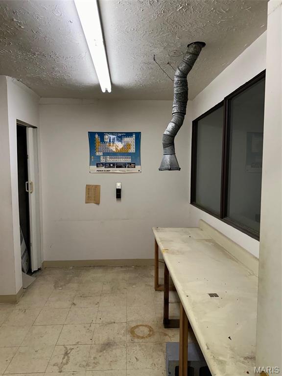 2643 Gravois Ave, Saint Louis, MO 63118 - hall with light floors and baseboards