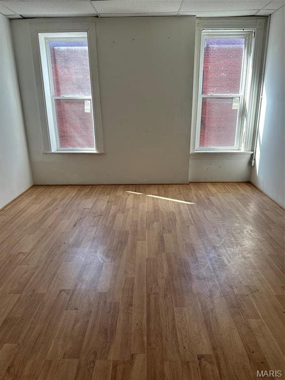 2643 Gravois Ave, Saint Louis, MO 63118 - empty room with wood finished floors and plenty of natural light