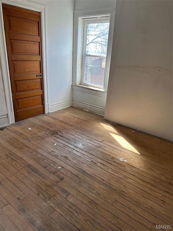 2643 Gravois Ave, Saint Louis, MO 63118 - spare room featuring hardwood / wood-style flooring