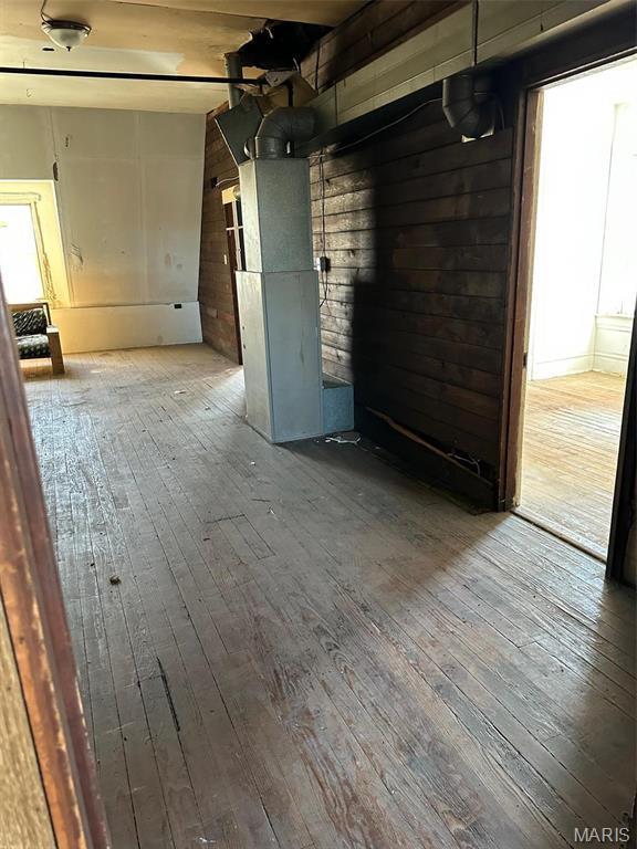 2643 Gravois Ave, Saint Louis, MO 63118 - unfurnished room with hardwood / wood-style flooring and healthy amount of natural light