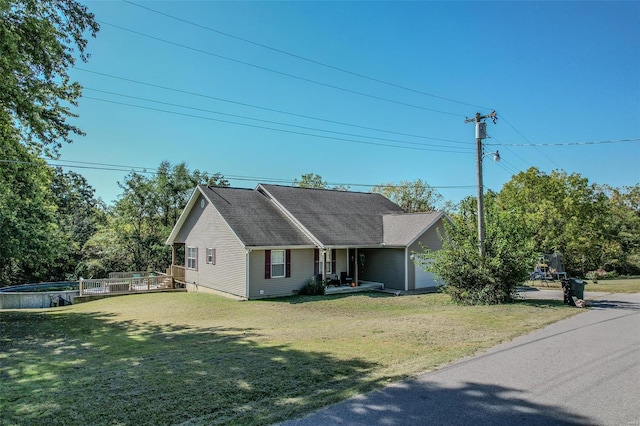 735 Dale Ln, Richland, MO 65556 - view of front of property featuring a front yard, covered porch, and a pool