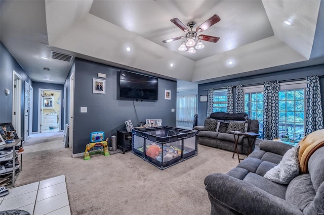 735 Dale Ln, Richland, MO 65556 - carpeted living room with ceiling fan, a raised ceiling, and recessed lighting