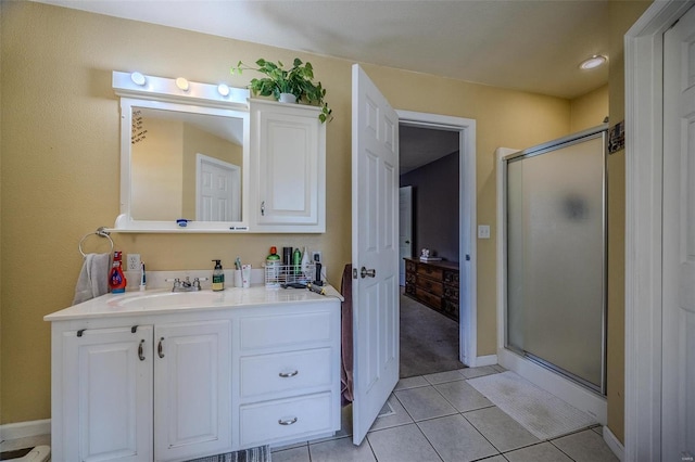 735 Dale Ln, Richland, MO 65556 - full bath with a shower stall, vanity, baseboards, and tile patterned floors
