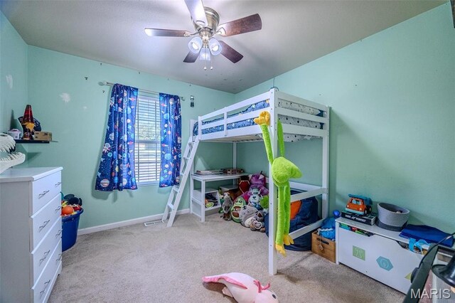 735 Dale Ln, Richland, MO 65556 - carpeted bedroom with baseboards and a ceiling fan