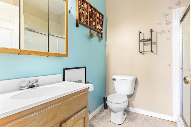 6400 Hoot Owl Ln, French Village, MO 63036 - bathroom featuring toilet, vanity, baseboards, and tile patterned flooring