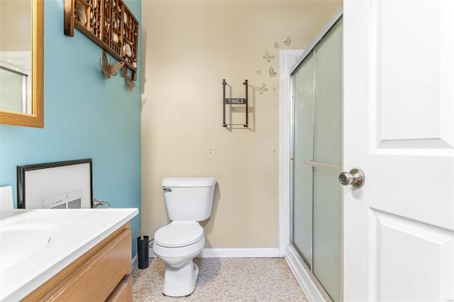 6400 Hoot Owl Ln, French Village, MO 63036 - bathroom featuring a stall shower, vanity, toilet, baseboards, and tile patterned floors