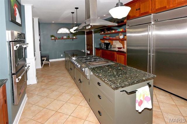 589 Wetherby Terrace Dr, Ballwin, MO 63021 - kitchen with appliances with stainless steel finishes, island range hood, open shelves, light tile patterned flooring, and a center island