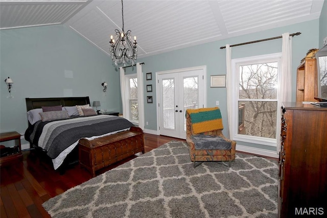 589 Wetherby Terrace Dr, Ballwin, MO 63021 - bedroom featuring wood finished floors, a chandelier, vaulted ceiling, access to exterior, and multiple windows