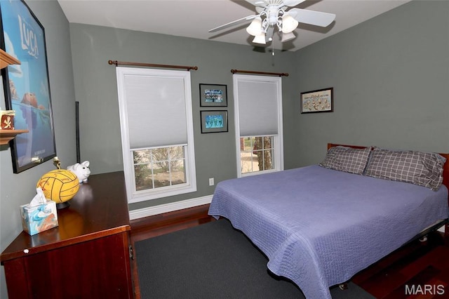 589 Wetherby Terrace Dr, Ballwin, MO 63021 - bedroom with wood finished floors, baseboards, and a ceiling fan