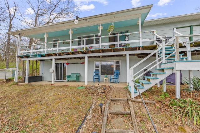 9449 E Lake View Dr, Bonne Terre, MO 63628 - rear view of house featuring a patio, a deck, and stairway