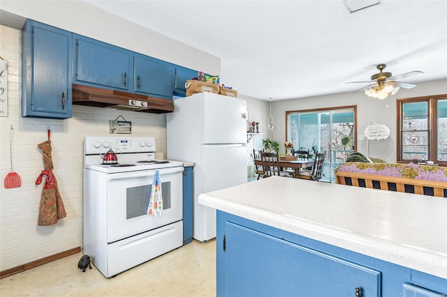 9449 E Lake View Dr, Bonne Terre, MO 63628 - kitchen with white appliances, blue cabinetry, under cabinet range hood, light countertops, and ceiling fan