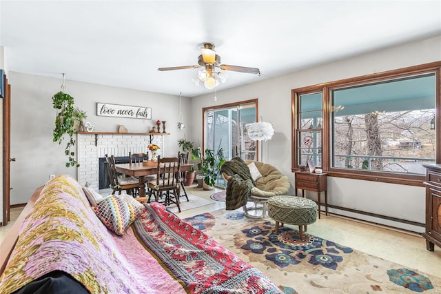 9449 E Lake View Dr, Bonne Terre, MO 63628 - living area featuring baseboard heating and ceiling fan