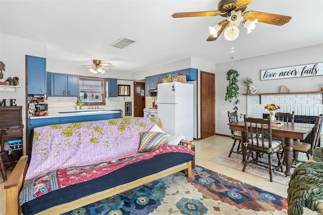 9449 E Lake View Dr, Bonne Terre, MO 63628 - bedroom with freestanding refrigerator and a sink