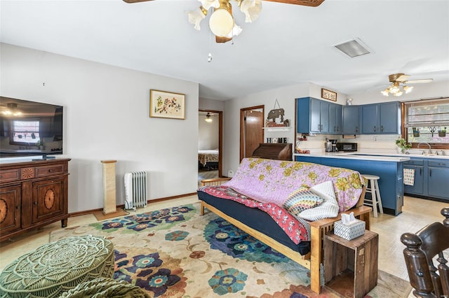 9449 E Lake View Dr, Bonne Terre, MO 63628 - living room featuring ceiling fan and radiator