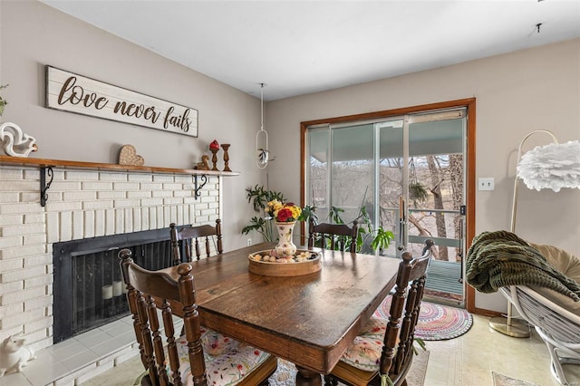9449 E Lake View Dr, Bonne Terre, MO 63628 - dining space with a brick fireplace