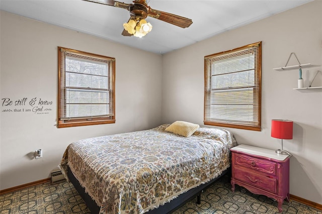 9449 E Lake View Dr, Bonne Terre, MO 63628 - bedroom featuring baseboards, multiple windows, and a baseboard heating unit