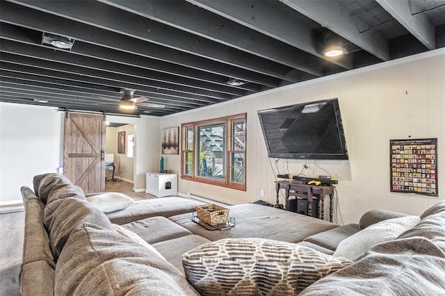 9449 E Lake View Dr, Bonne Terre, MO 63628 - living room featuring a barn door, a baseboard radiator, and baseboards