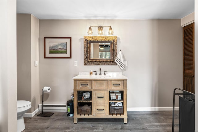 9449 E Lake View Dr, Bonne Terre, MO 63628 - bathroom featuring wood finished floors, toilet, and baseboards