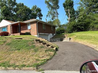 7143 Roland Blvd, Northwoods, MO 63121 - photo 1