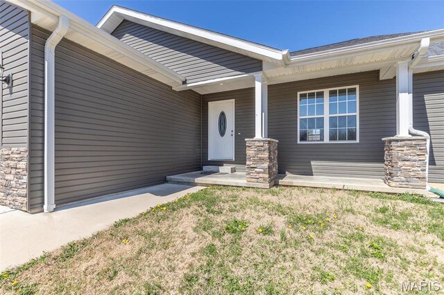 151 Alisha Ave, Poplar Bluff, MO 63901 - entrance to property featuring covered porch and stone siding