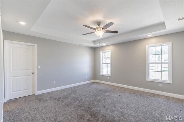151 Alisha Ave, Poplar Bluff, MO 63901 - carpeted spare room with a raised ceiling, recessed lighting, baseboards, and a ceiling fan