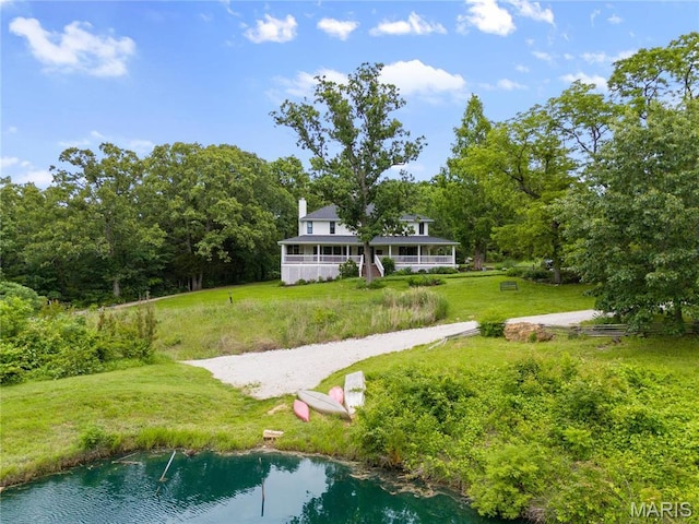 3724 Nadler Rd, Mo, MO 63385 - view of home's community with a lawn and a wooded view