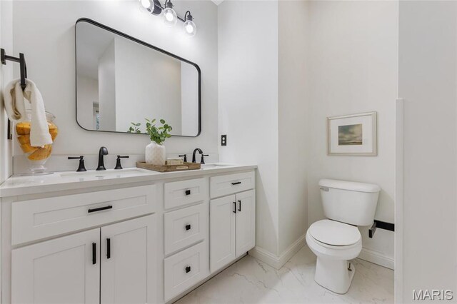 3724 Nadler Rd, Mo, MO 63385 - bathroom featuring marble finish flooring, toilet, baseboards, and double vanity