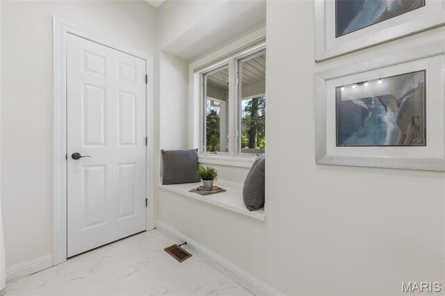3724 Nadler Rd, Mo, MO 63385 - entryway featuring light marble finish flooring and baseboards
