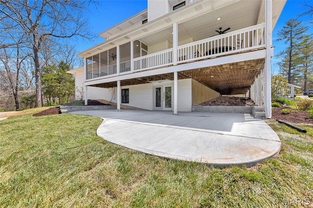 3724 Nadler Rd, Mo, MO 63385 - rear view of house featuring a patio, a ceiling fan, a yard, french doors, and a sunroom