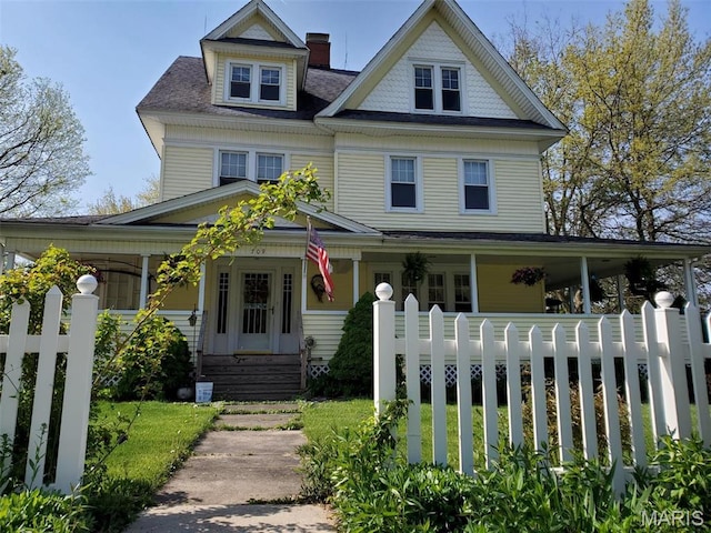 708 E Fillmore St E, Fillmore, IL 62032 - victorian house with fence and covered porch