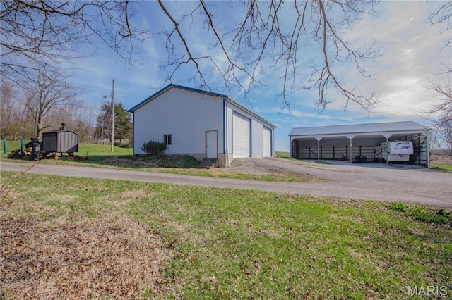 708 E Fillmore St E, Fillmore, IL 62032 - view of shed featuring driveway