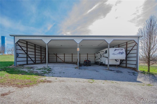 708 E Fillmore St E, Fillmore, IL 62032 - view of vehicle parking featuring driveway and a carport