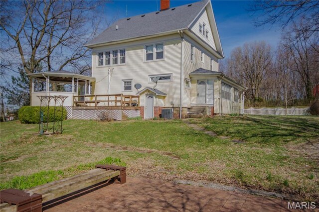 708 E Fillmore St E, Fillmore, IL 62032 - rear view of house with a wooden deck, entry steps, a chimney, cooling unit, and roof with shingles