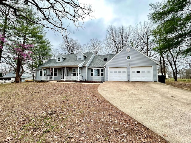 201 Bobby Dale Dr, Waynesville, MO 65583 - cape cod-style house with a porch, concrete driveway, a garage, and roof with shingles