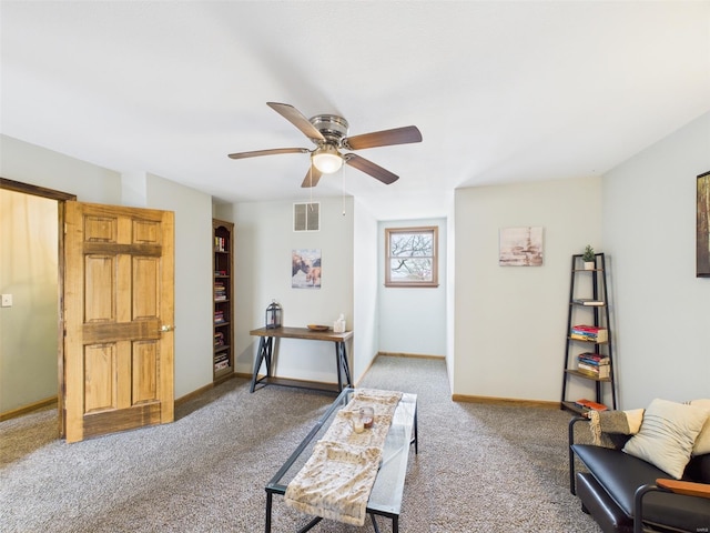 201 Bobby Dale Dr, Waynesville, MO 65583 - living area with carpet floors, a ceiling fan, and baseboards