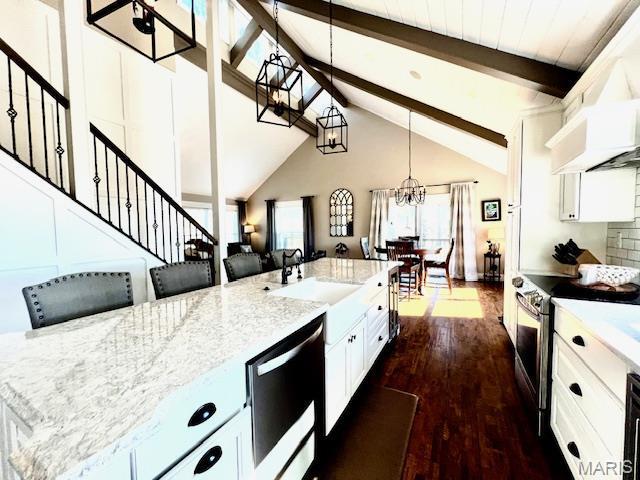 1437 Palisades Rd, Wildwood, MO 63021 - kitchen with stainless steel range with electric cooktop, a sink, a chandelier, beam ceiling, and dark wood-style floors