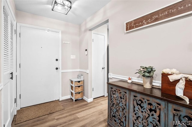13507 Coliseum Dr Unit F, Chesterfield, MO 63017 - entrance foyer featuring light wood-style floors and baseboards