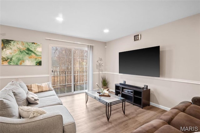 13507 Coliseum Dr Unit F, Chesterfield, MO 63017 - living room featuring wood finished floors, baseboards, and recessed lighting