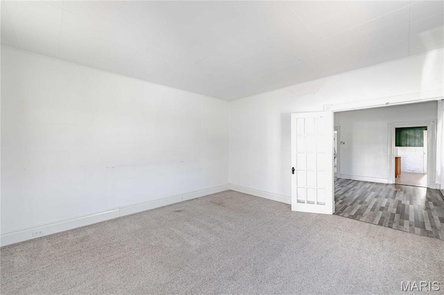 8432 Tennessee Ave, Saint Louis, MO 63125 - carpeted empty room with baseboards