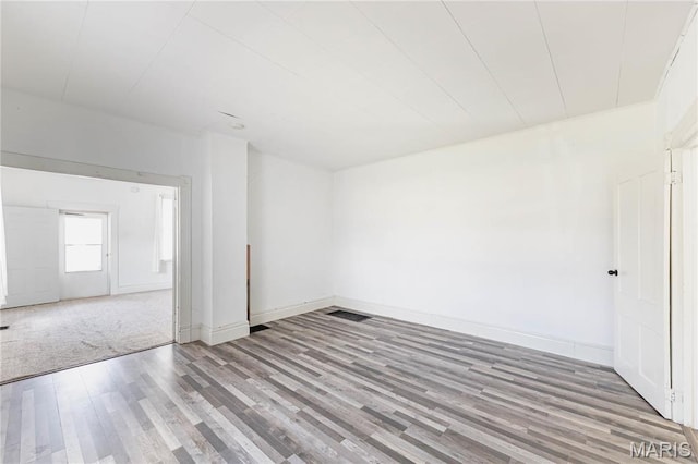 8432 Tennessee Ave, Saint Louis, MO 63125 - unfurnished room featuring wood finished floors and baseboards