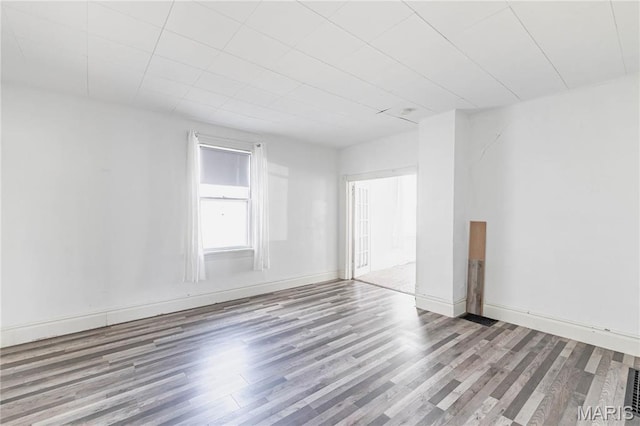 8432 Tennessee Ave, Saint Louis, MO 63125 - empty room featuring wood finished floors and baseboards