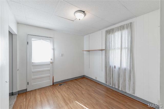 8432 Tennessee Ave, Saint Louis, MO 63125 - unfurnished room with light wood finished floors and a drop ceiling