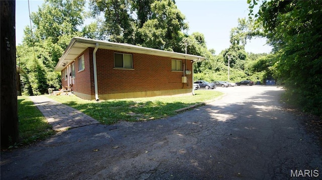 1209 Chambers Rd, Ferguson, MO 63135 - view of property exterior with brick siding