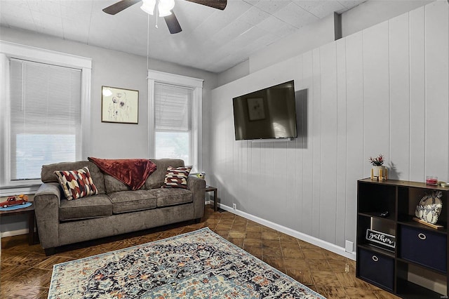 4242 Walsh St, Saint Louis, MO 63116 - living area with ceiling fan and baseboards