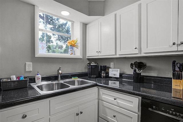 4242 Walsh St, Saint Louis, MO 63116 - kitchen with a sink, black dishwasher, white cabinets, and dark countertops