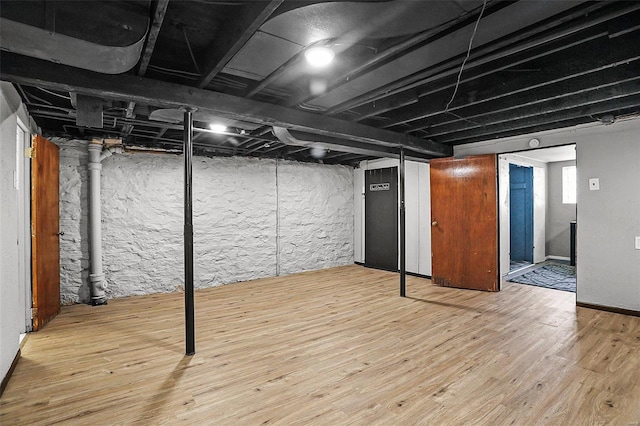 4242 Walsh St, Saint Louis, MO 63116 - finished basement featuring wood finished floors