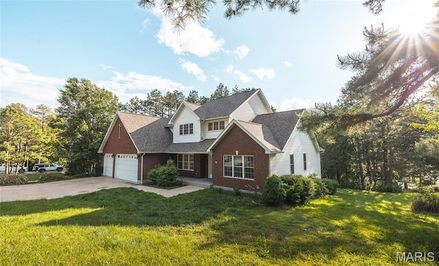 10625 Pine Needle Cir, Rolla, MO 65401 - traditional-style home featuring brick siding, a front lawn, concrete driveway, and a garage