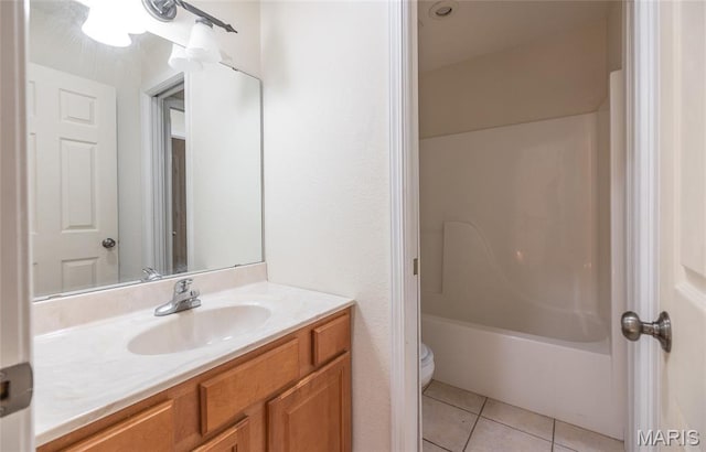 10625 Pine Needle Cir, Rolla, MO 65401 - full bathroom with toilet, vanity, tile patterned floors, and shower / washtub combination